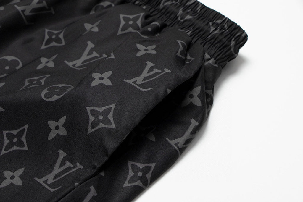 Louis Vuitton Full Logo Print Swim Trunks – Black