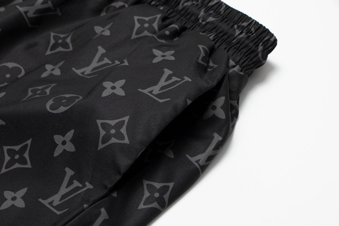 Louis Vuitton Full Logo Print Swim Trunks – Black